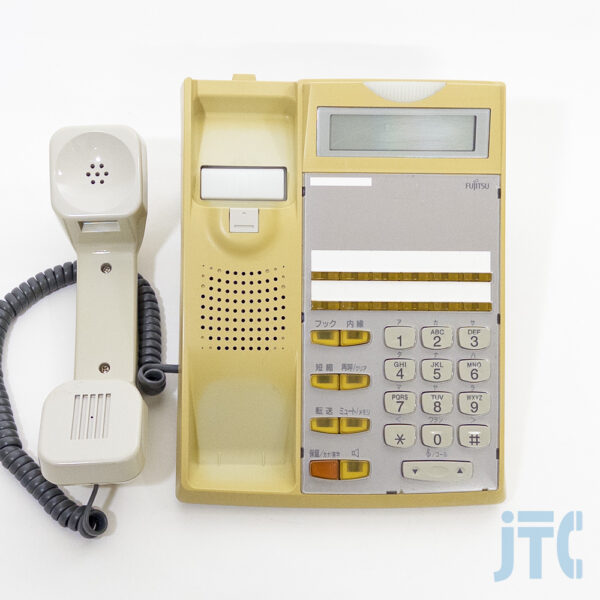 富士通 FC771B 電話機 日焼けあり 受話器を外して真上から撮影した写真